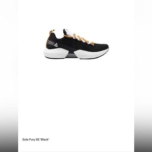 Mens Reebok Sole Fury SE Black and Orange size 11, brand new.